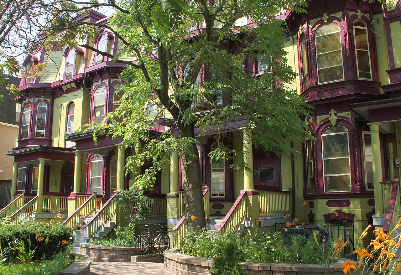 A quiet residential street of Victorian houses in Toronto's Cabbagetown neighbourhood.